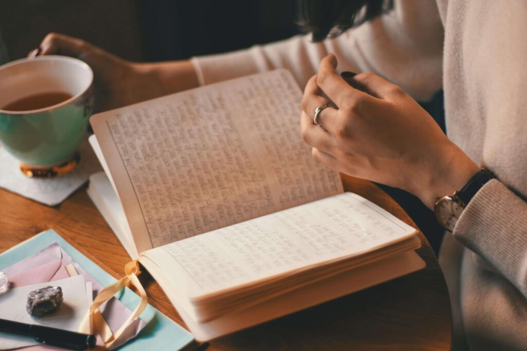 a person writing a book